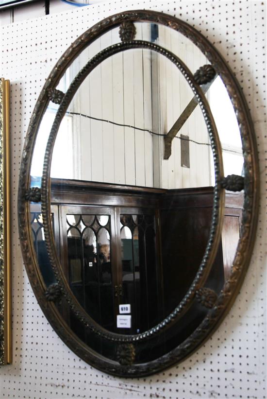 Oval gilt wall mirror